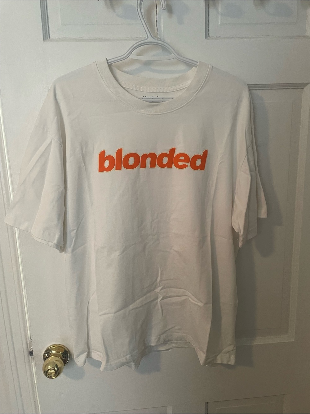 White "blonded" Graphic Tee with Orange Logo
